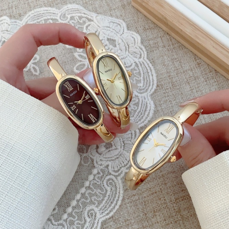 Vintage Fashion Watches - Top-Marke Damen Ovale Römische Ziffernblatt Quarzuhr