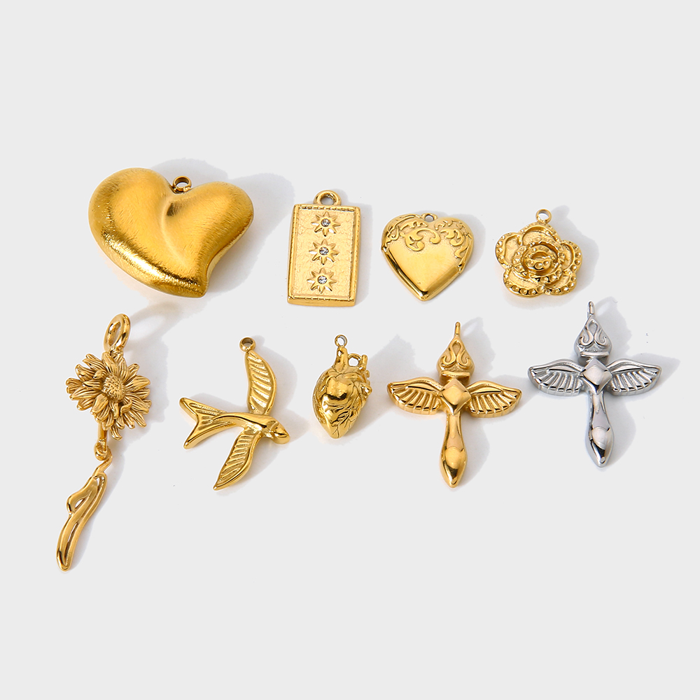 Vintage Fashion Finds - Vintage Herz Blumen Schwalbe Anhänger 18K